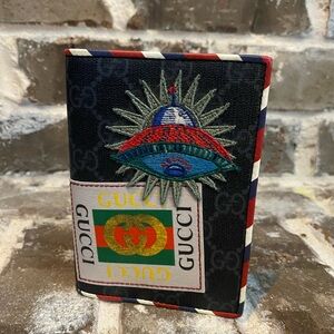 Gucci GG Supreme Night Courrier Passport Wallet